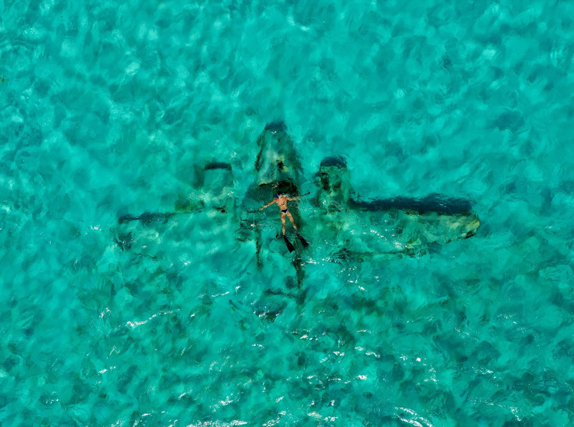 Boat on turquoise water near Lucaya Marina, Grand Bahama